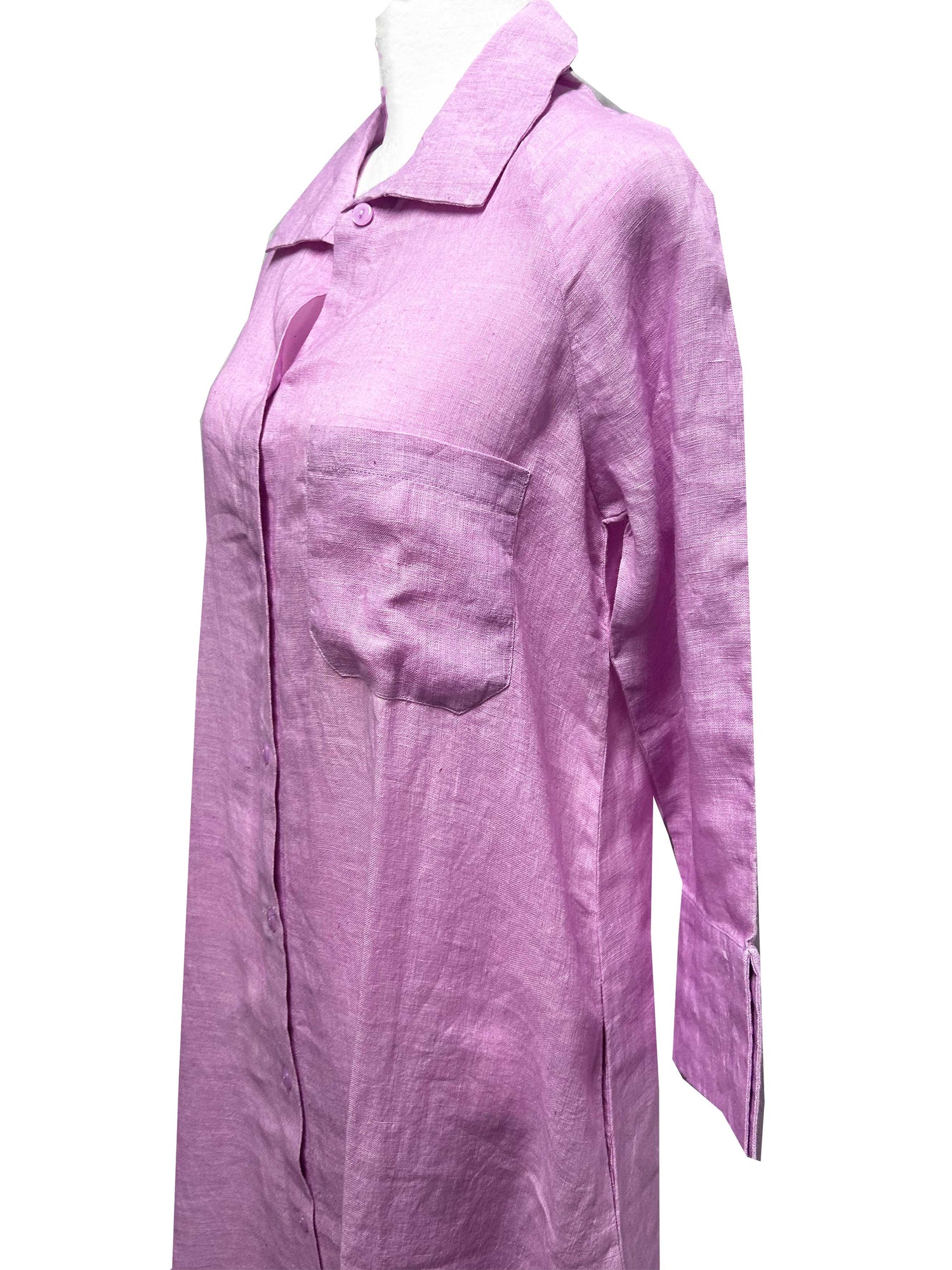 Rosehip Design Lucy Dress is a classic Shirt dress with 3/4 length sleeves, side pockets, front buttons and curved side slits. Made from 100% Linen in vivid Lilac.