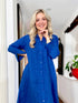 Rosehip Design Lucy Dress is a classic Shirt dress with 3/4 length sleeves, side pockets, front buttons and curved side slits. Made from 100% Linen in brilliant blue Sapphire.