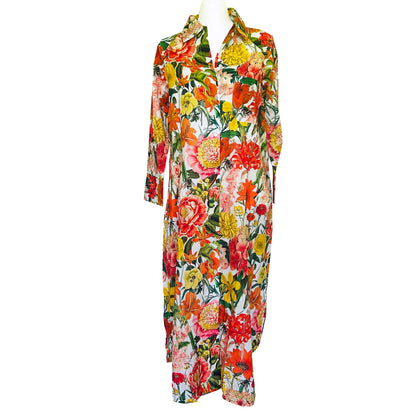 Rosehip Design Lucy Dress is a classic Shirt dress with 3/4 length sleeves, side pockets, front buttons and curved side slits. Made from 100% cotton, in our striking Marigolds design of bright citrus colours it&