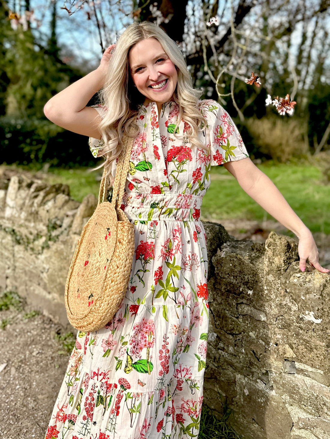 The Margot cotton dress in Spring Blossom is a beautifully feminine and effortless dress, designed for all-day comfort. Featuring a double elasticated waistband for a flattering fit, a flowing tiered skirt, and short capped sleeves, it blends elegance with ease. With the added practicality of pockets, it’s perfect for both casual outings and special occasions.