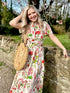 The Margot cotton dress in Spring Blossom is a beautifully feminine and effortless dress, designed for all-day comfort. Featuring a double elasticated waistband for a flattering fit, a flowing tiered skirt, and short capped sleeves, it blends elegance with ease. With the added practicality of pockets, it’s perfect for both casual outings and special occasions.