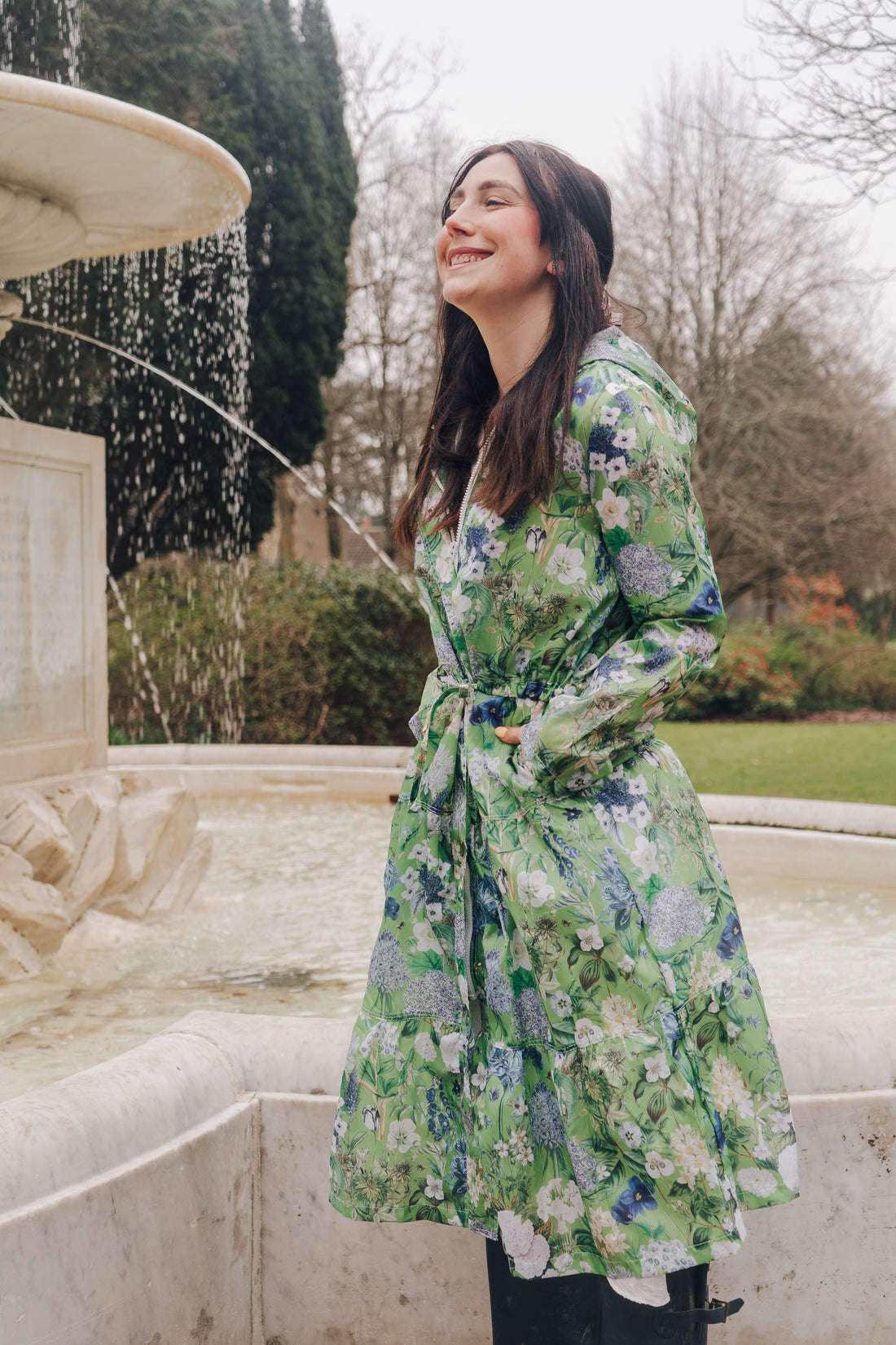 Beautiful light-weight calf length summer parka in a fresh Spring Green design. 
The Windsor Parka from Rosehip Design has a long tiered skirt, drawstring waist and fully lined hood.
