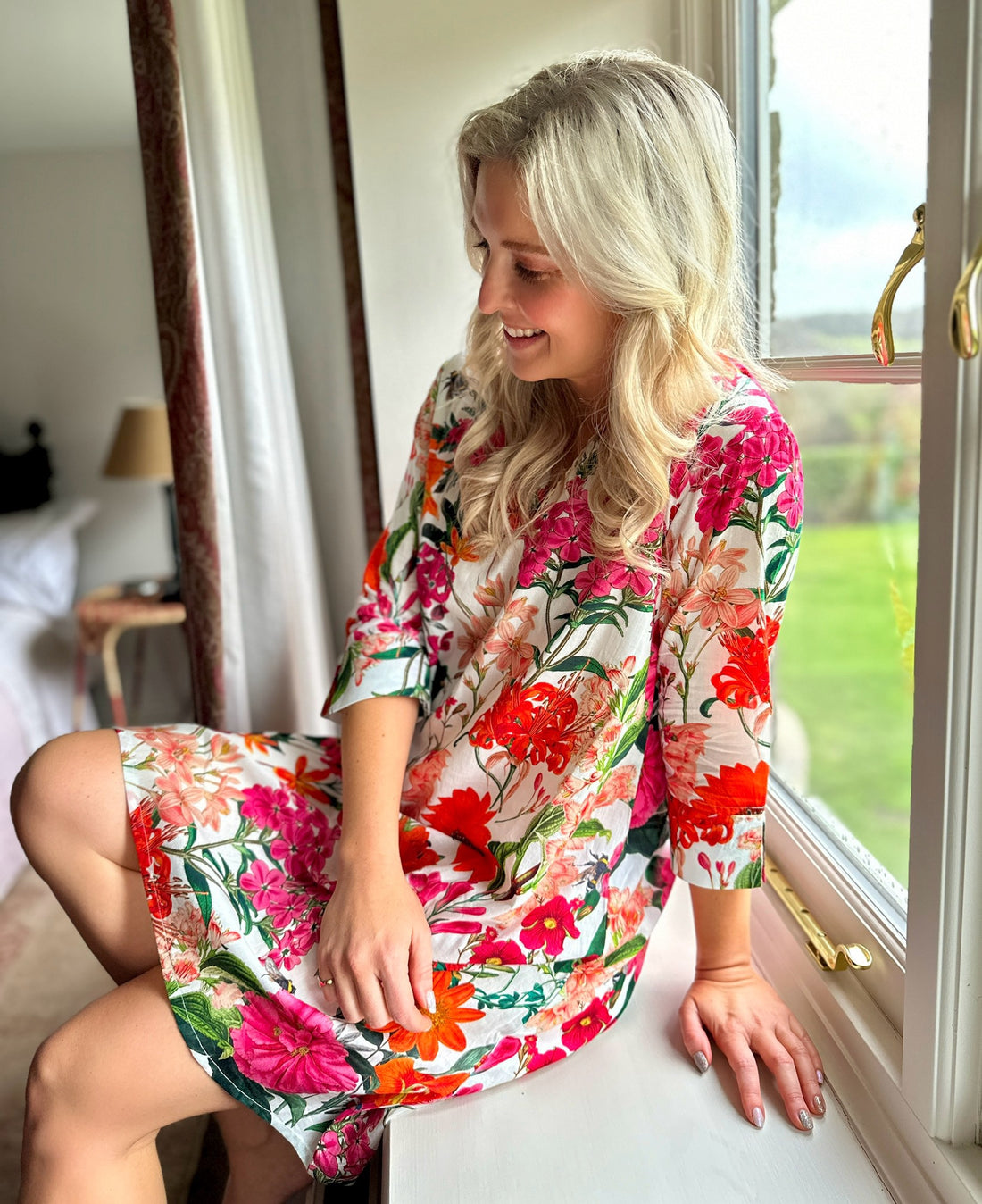 Rosehip Design Nightdress is a lovely knee-length nightdress made of cotton voile in our bold Radiance print. The Nightdress has 3/4 length sleeves and detail around the collar.