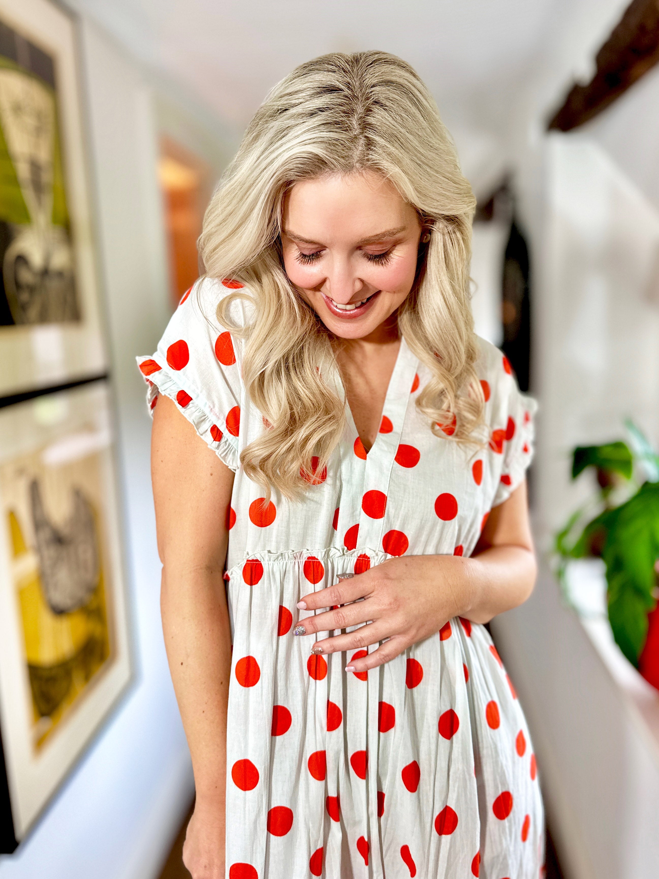 Rosehip Design Olivia is a beautiful cotton dress in our happy and fun Orange Dot print. The Olivia dress has short, capped sleeves with a rough frill. The skirt is tiered and has pockets.