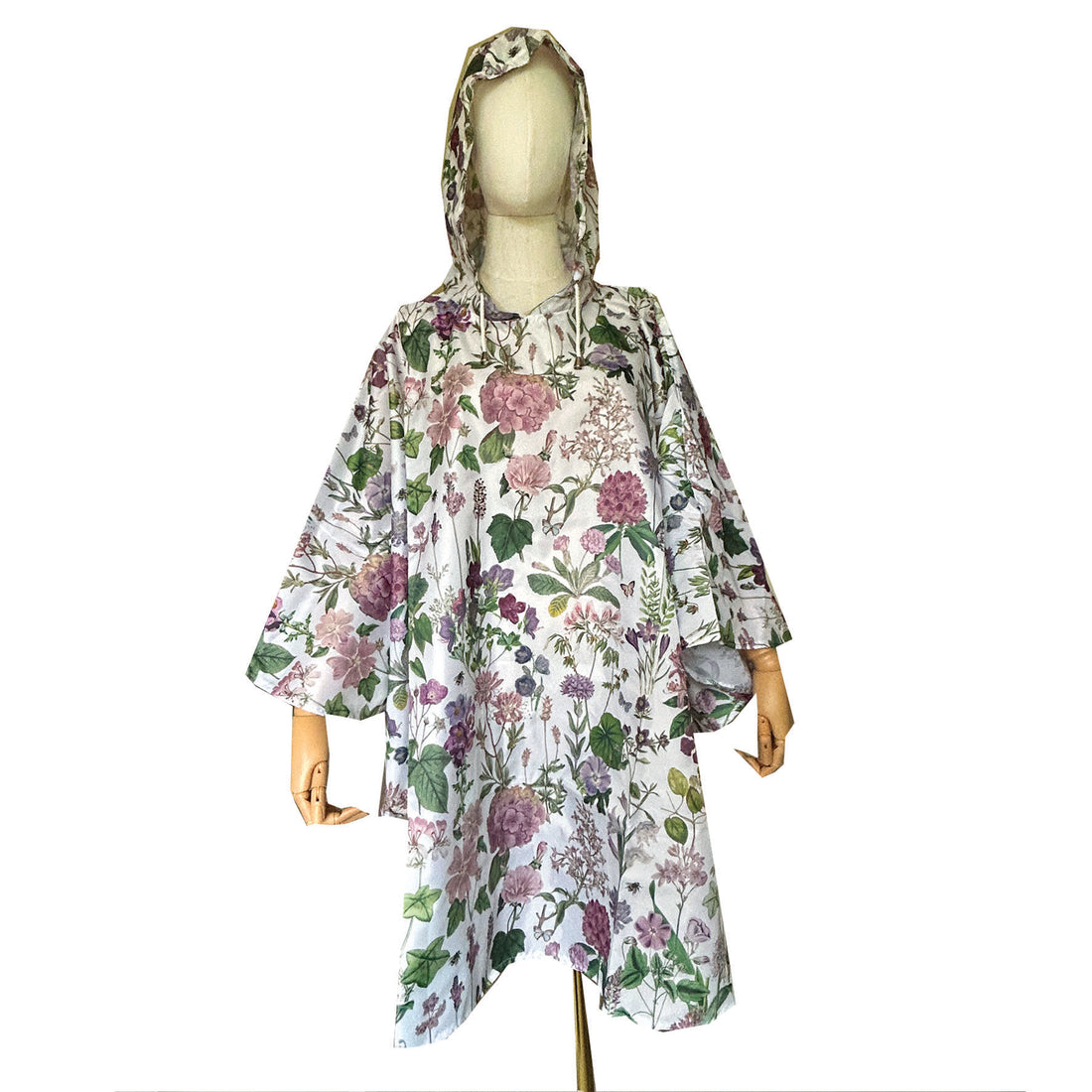 Stand out from the crowd in a beautiful floral Rain Poncho from Rosehip Design. It brings a splash of colour to rainy days offering both style and protection. Featuring vibrant floral prints combining fashion with functionality. Made from lightweight, waterproof material, the Rosehip Rain Poncho is designed for easy portability, folding neatly into a compact drawstring bag. Ideal for on-the-go use, ensuring you stay dry without sacrificing style.