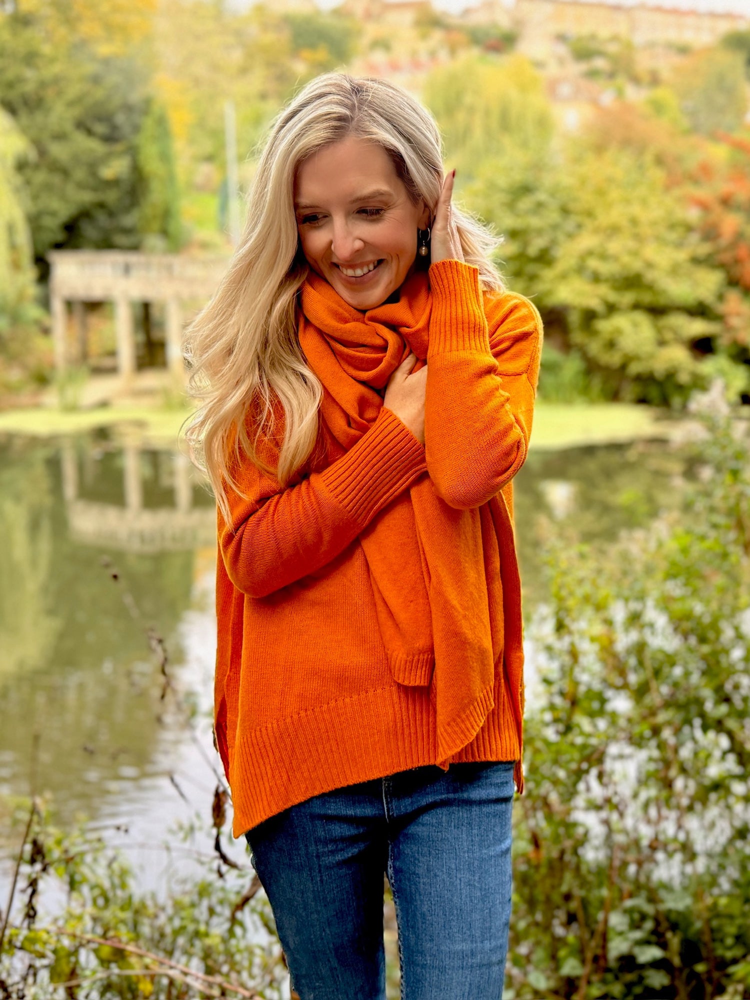 Stay effortlessly stylish and snug in this Rosehip Design woollen roll neck jumper, designed with a modern high-low hem that falls longer at the back for a flattering, easy silhouette. Crafted from soft, warming wool, it offers both comfort and elegance — perfect for layering on chilly days. The classic roll neck adds a touch of sophistication, while the relaxed fit makes it a versatile wardrobe staple you’ll reach for all season.