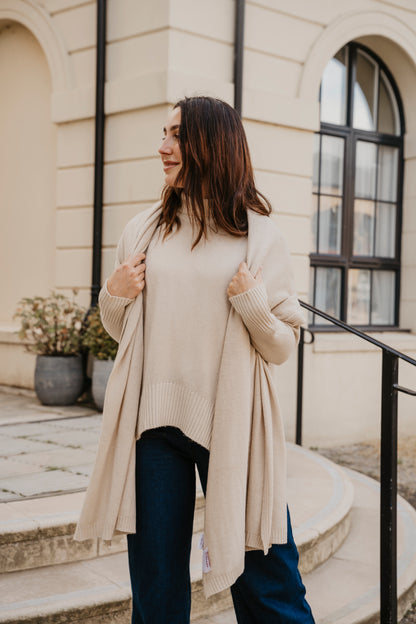 Stay effortlessly stylish and snug in this Rosehip Design woollen roll neck jumper, designed with a modern high-low hem that falls longer at the back for a flattering, easy silhouette. Crafted from soft, warming wool, it offers both comfort and elegance — perfect for layering on chilly days. The classic roll neck adds a touch of sophistication, while the relaxed fit makes it a versatile wardrobe staple you’ll reach for all season.