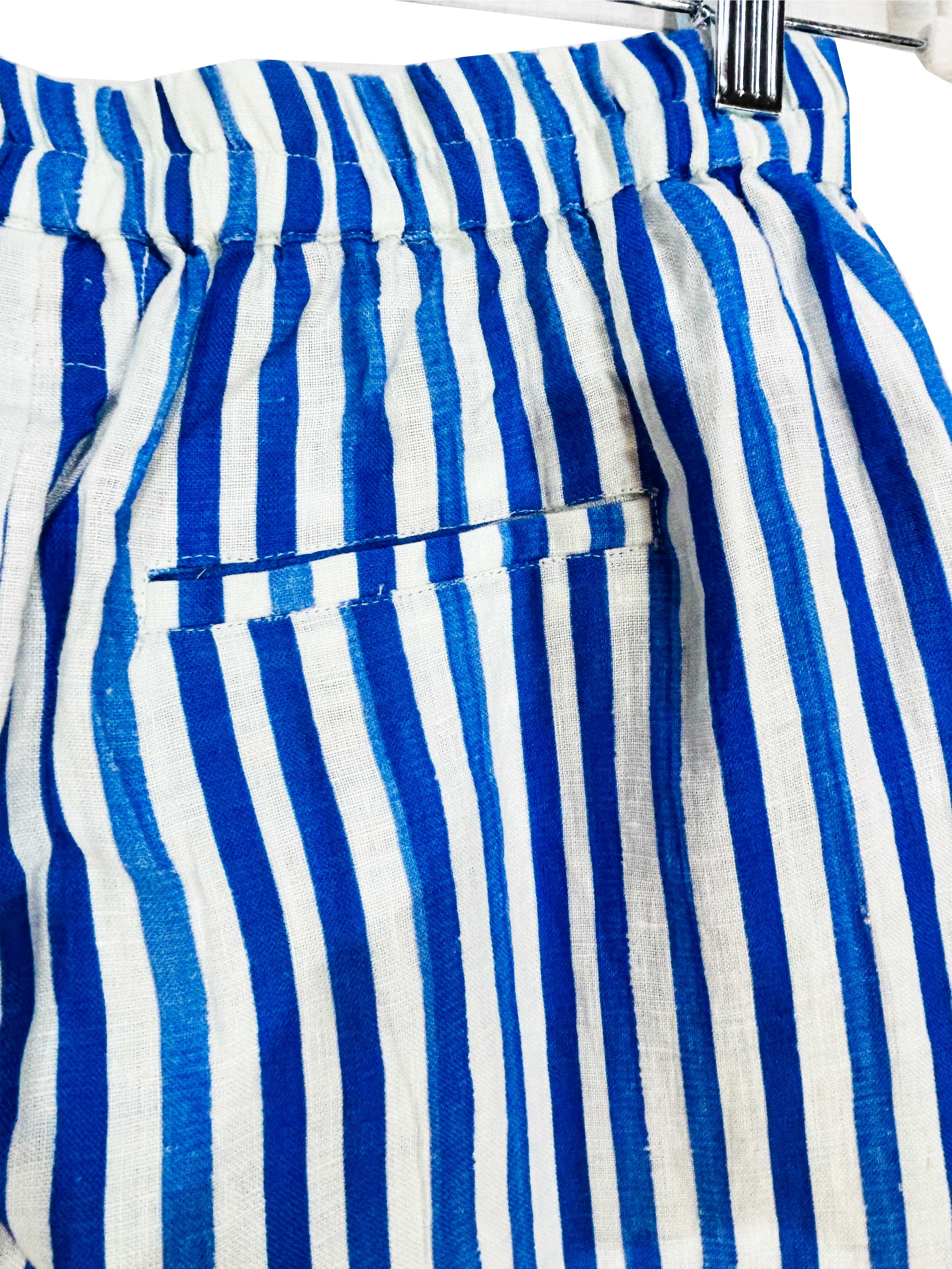 Rosehip Design Roma Trousers are comfortable and casual with an elasticated waist, pockets in the front and on the back. They are made from 100% soft Indian cotton and printed in a fun, washed blue, Marine stripe. Team with the Julia Shirt. 