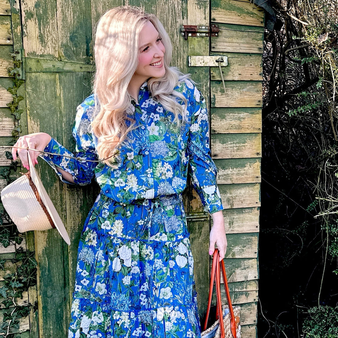 Rosehip Design Sarah Cotton Shirt is a timeless wardrobe staple, made of soft cotton. It features a classic button-down front, elegant sleeves that end just before the wrist, and a gently curved hem for a relaxed yet polished look.
Featuring our bright Spring Blues print, this shirt is a celebration of summer, bursting with lively hues and intricate floral patterns. Perfect for warm-weather styling, it pairs beautifully with the matching Sally Skirt for a coordinated ensemble.