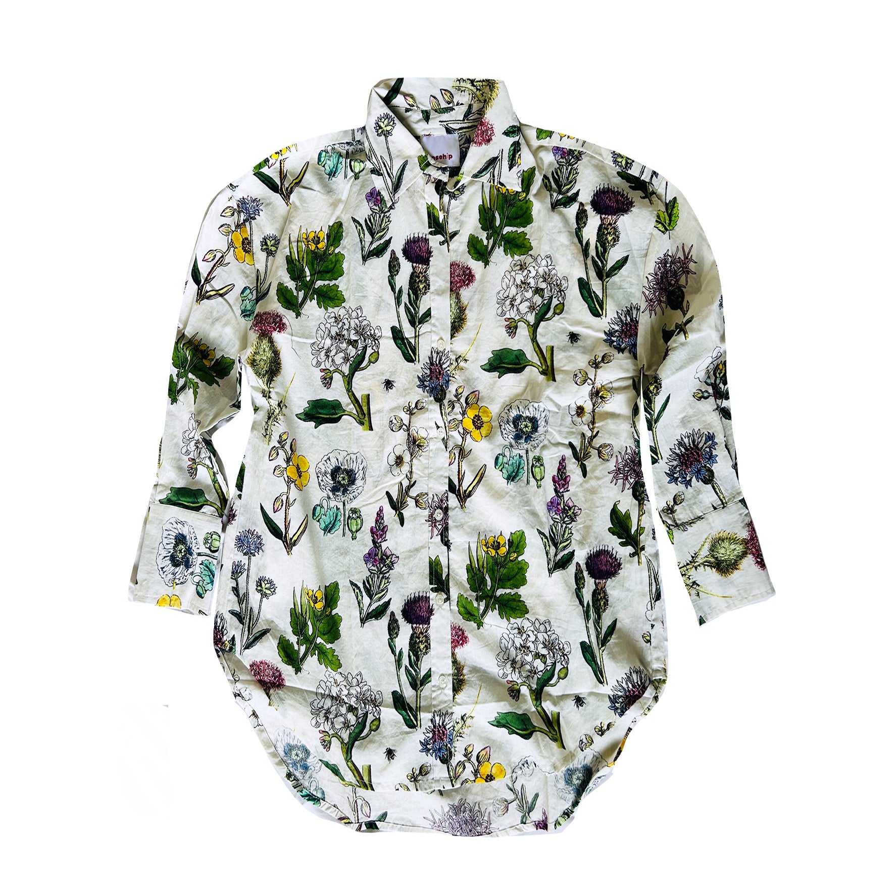 Rosehip Design Sarah Cotton Shirt is a timeless wardrobe staple, made of soft cotton. It features a classic button-down front, elegant sleeves that end just before the wrist, and a gently curved hem for a relaxed yet polished look.

Featuring our spiky Thistle design, this shirt is a celebration of summer, bursting with lively hues and intricate floral patterns. Perfect for warm-weather styling, it pairs beautifully with the matching Sally Skirt for a coordinated ensemble.