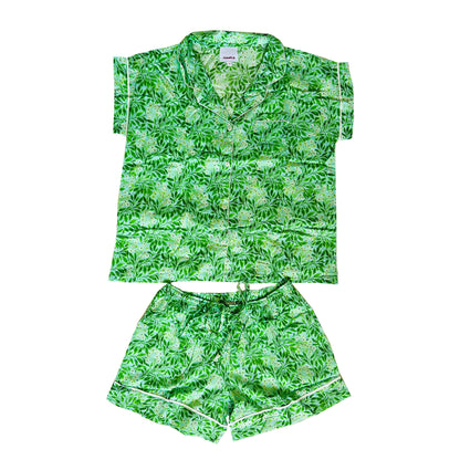 A lovely Rosehip Design short pyjama set in cotton voile with floral print. The top is buttoned with piping detail and the shorts are elasticated and have a drawstring.