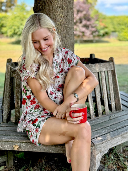 A lovely Rosehip Design short pyjama set in cotton voile with floral print. The top is buttoned with piping detail and the shorts are elasticated and have a drawstring.