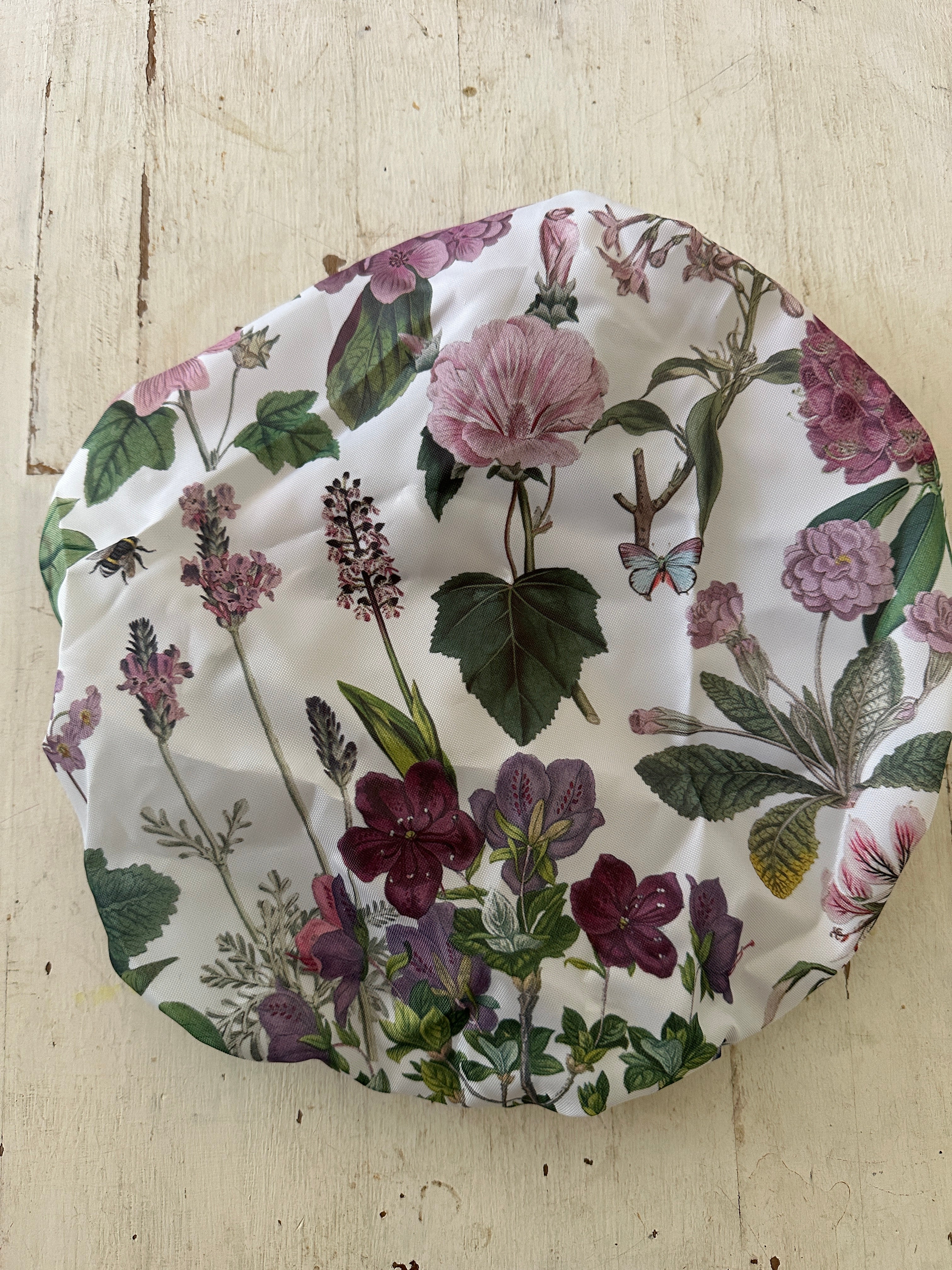 Rosehip Design Shower Cap is functional, fabulous and funky in our stunning Mallow design of pinks, lilacs and greens. Made from waterproof Oxford material it has a generous fit.