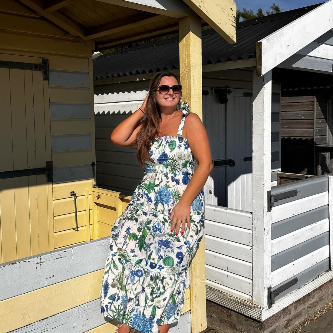 Rosehip Design Tropez Sundress is a gorgeous Summer dress featuring a shirred top with straps and a long flowing skirt with pockets. Perfect holiday wear in our classy Cobalt design.