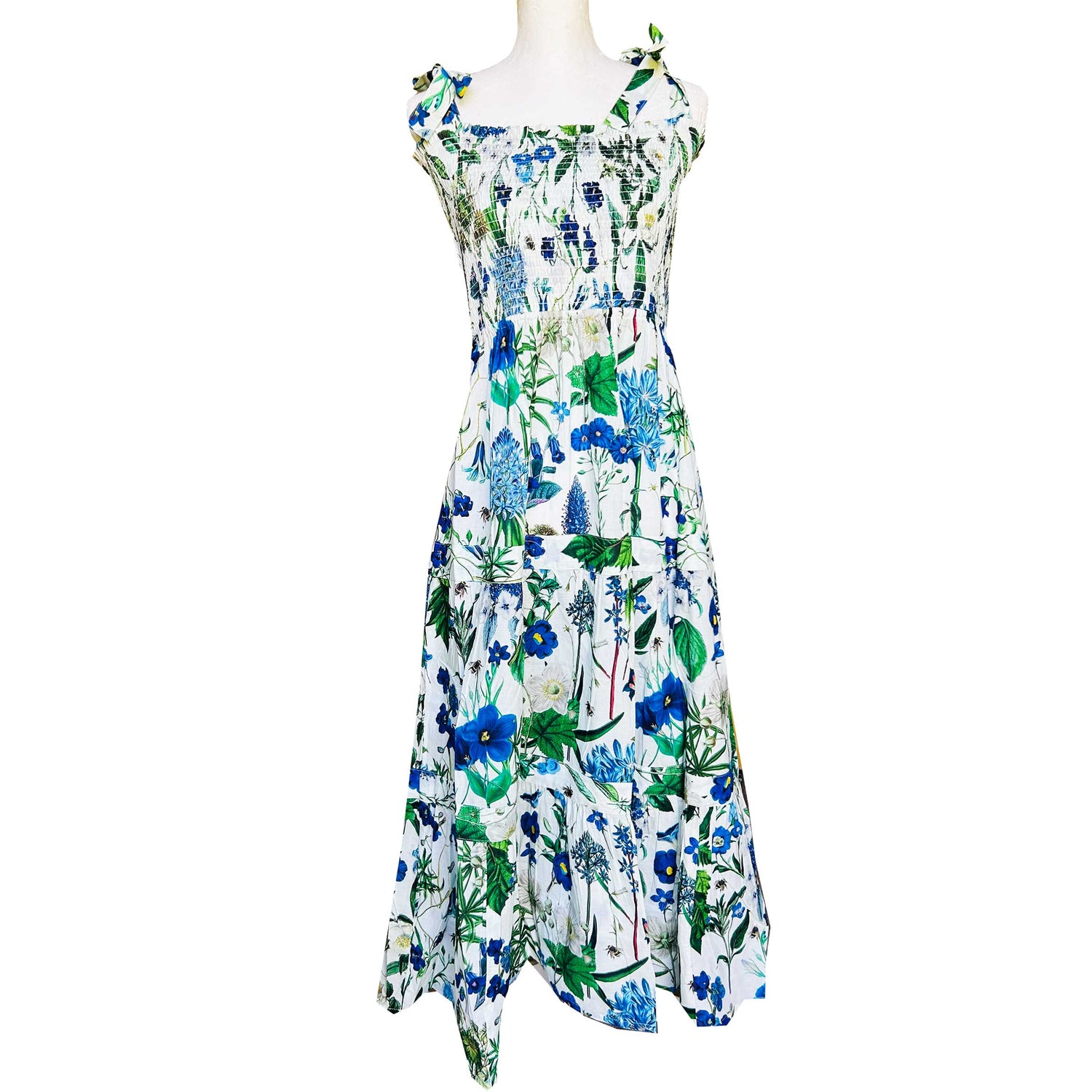 Rosehip Design Tropez Sundress is a gorgeous Summer dress featuring a shirred top with straps and a long flowing skirt with pockets. Perfect holiday wear in our classy Cobalt design.