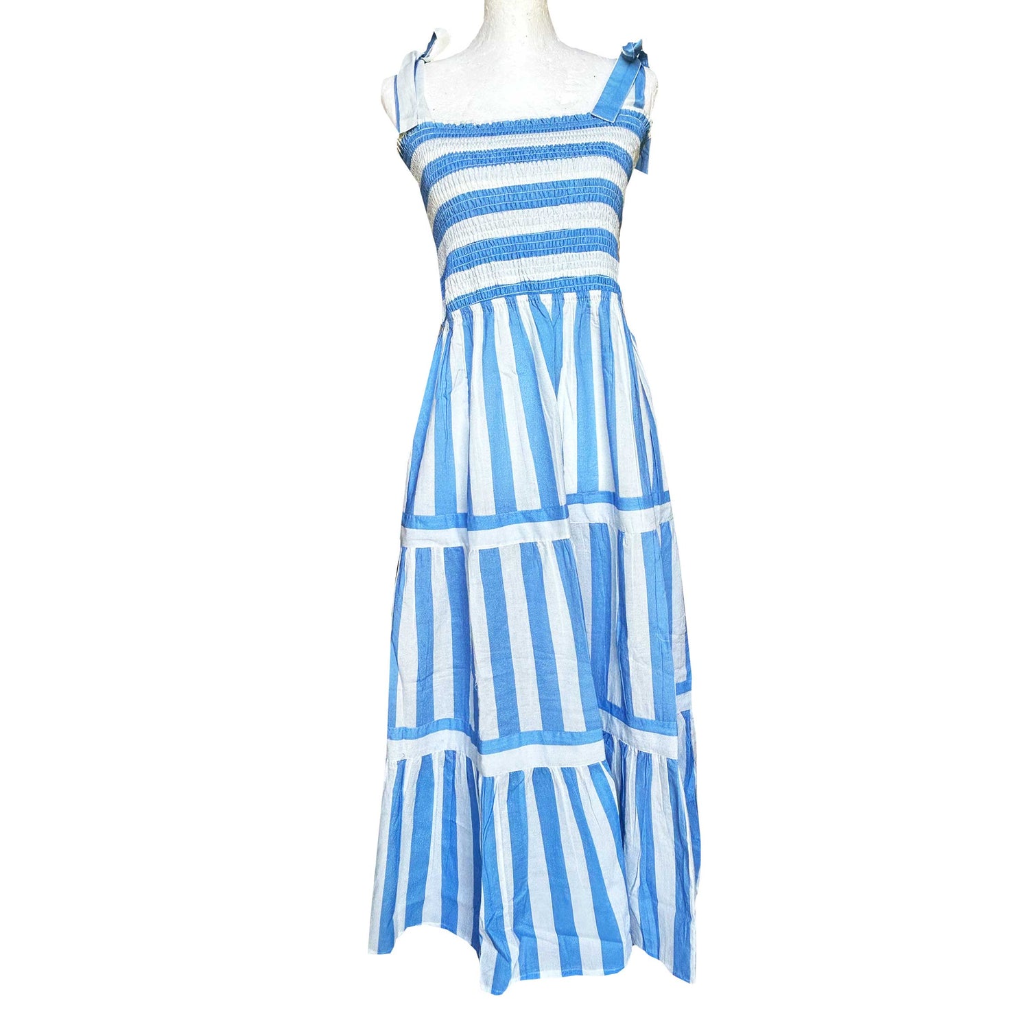 Rosehip Design Tropez Sundress is a gorgeous Summer dress featuring a shirred top with straps and a long flowing skirt with pockets. Perfect beachwear in our wide Periwinkle blue and white stripes design.