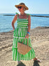 Rosehip Design Tropez Sundress is a gorgeous Summer dress featuring a shirred top with straps and a long flowing skirt with pockets. Perfect holiday wear in our dazzling Verde green and white stripes design.