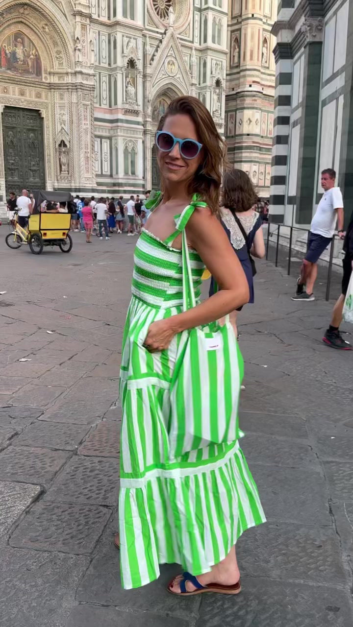 Rosehip Design Tropez Sundress is a gorgeous Summer dress featuring a shirred top with straps and a long flowing skirt with pockets. Perfect holiday wear in our dazzling Verde green and white stripes design.