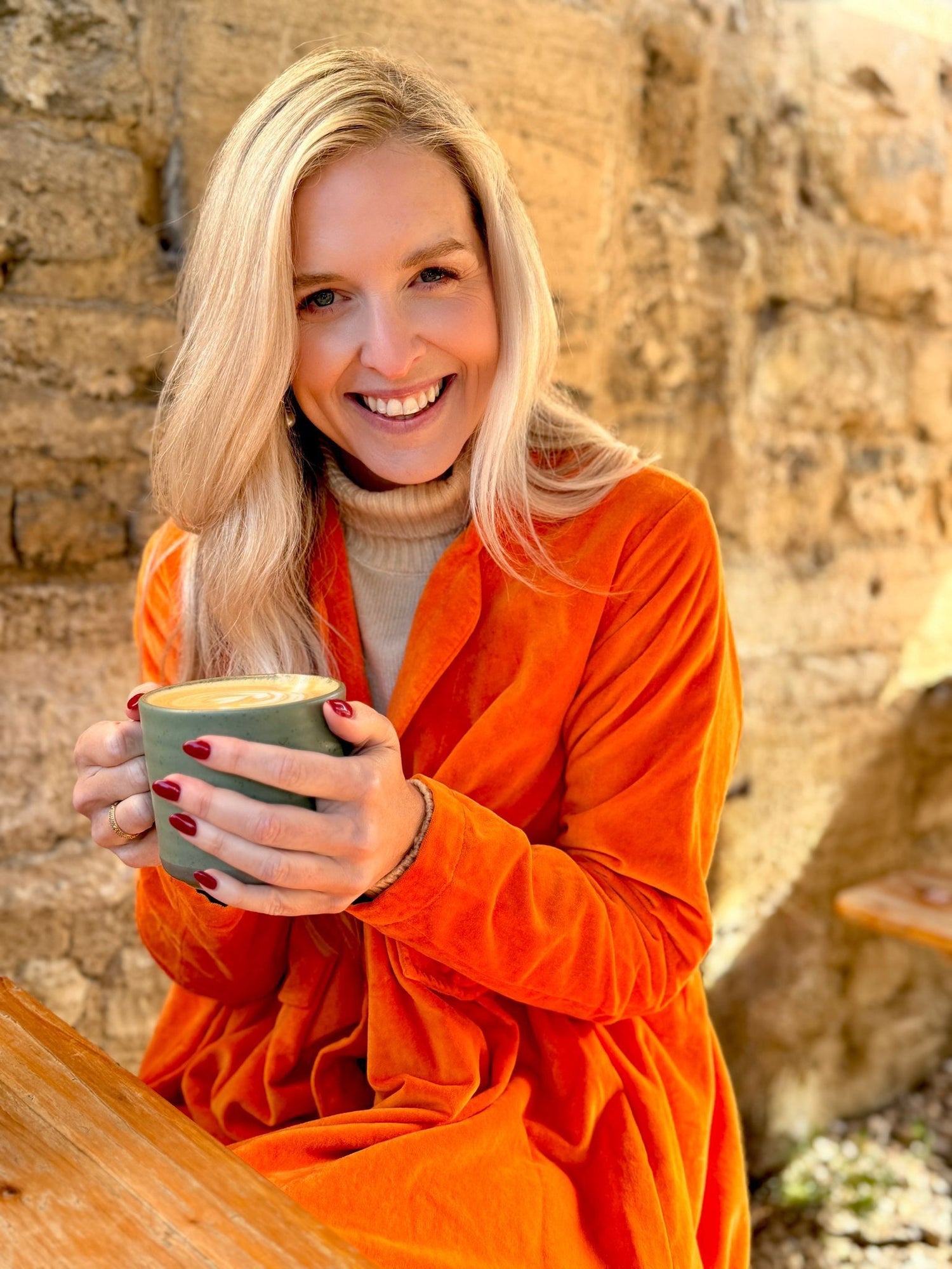 Wrap yourself in autumn warmth with this Rosehip Design statement velvet coat, in a rich, vibrant orange that perfectly echoes the season. The soft velvet exterior is complemented by a classic check lining, adding a touch of timeless style to its bold, modern silhouette. Luxuriously warm yet effortlessly wearable, it’s the perfect layer for crisp autumn days — whether you’re strolling through the countryside or heading into the city.