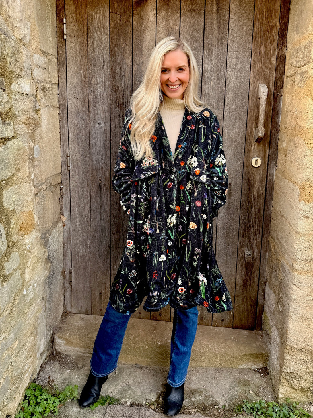Wrap yourself in autumn warmth with this statement velvet coat, in a rich, vibrant orange that perfectly echoes the season. The soft velvet exterior is complemented by a classic check lining, adding a touch of timeless style to its bold, modern silhouette. Luxuriously warm yet effortlessly wearable, it’s the perfect layer for crisp autumn days — whether you’re strolling through the countryside or heading into the city.