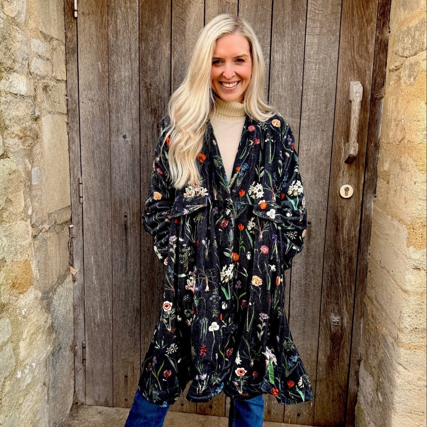 Wrap yourself in autumn warmth with this statement velvet coat, in a rich, vibrant orange that perfectly echoes the season. The soft velvet exterior is complemented by a classic check lining, adding a touch of timeless style to its bold, modern silhouette. Luxuriously warm yet effortlessly wearable, it’s the perfect layer for crisp autumn days — whether you’re strolling through the countryside or heading into the city.