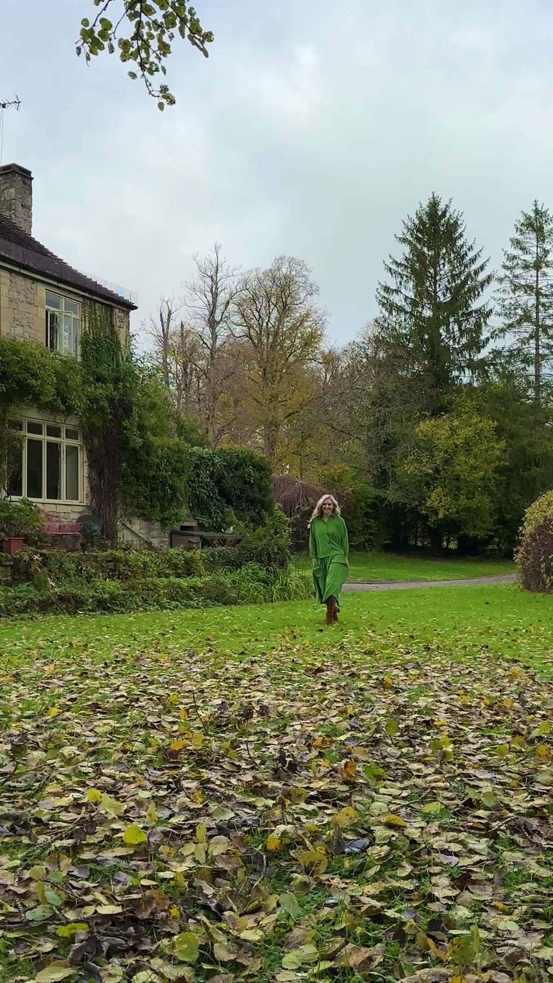 Rosehip Design Laura Dress - step into elegance with our Corduroy Maxi Dress, a perfect fusion of fashion and comfort in verdant Green. This dress boasts a gracefully dropped waist, creating a flattering and relaxed silhouette that effortlessly captures style with ease.