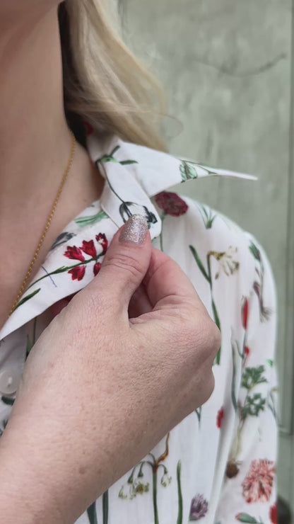 Easy, breezy and beautifully floral – the Georgie Dress is made from soft, breathable cotton and designed with sunny days in mind. Featuring our delightful April design - a fresh summery floral print, it has a relaxed tiered skirt, charming button-through front, and a detachable tie belt to style it your way. Wear it loose for an effortlessly laid-back look, or cinch it in for a more defined shape. Perfect for garden parties, picnics or simply soaking up the sunshine.